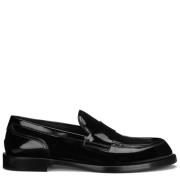 Sorte flade sko i læder med logo sål