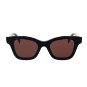 Geometriske solbriller med sort acetatramme og brune linser