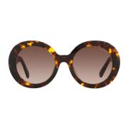 Runde solbriller med brune gradientlinser og guldglogo