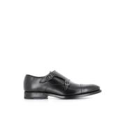 Sorte flade sko i børstet læder