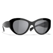 Ikoniske solbriller med grå polariserede linser