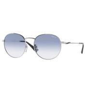 Stilfulde solbriller med blå gradientlinser