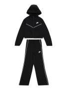 Nike Sportswear Joggingdragt  sort / hvid