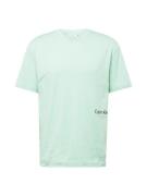Calvin Klein Bluser & t-shirts 'OFF PLACEMENT'  mint / sort
