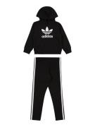 ADIDAS ORIGINALS Joggingdragt  sort / hvid