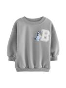 Next Sweatshirt 'Bluey'  lyseblå / mørkeblå / gul / grå / hvid