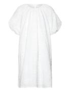 Dress .-- Pompi Mango White