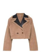 Sambino Munthe Brown