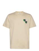 Bobby Logo T-Shirt Designers T-Kortærmet Skjorte Beige Wood Wood