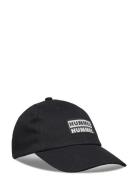 Hmlcaprio Cap Sport Headwear Caps Black Hummel