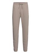 Sport Essentials French Terry Jogger Sport Sweatpants Beige New Balanc...